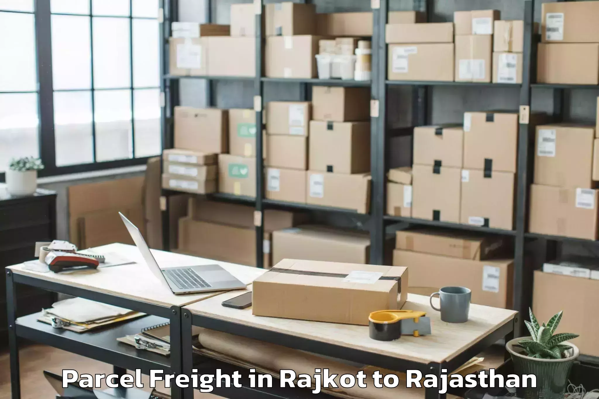 Efficient Rajkot to Nims University Jaipur Parcel Freight